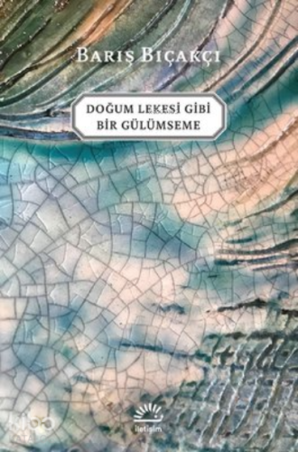 Doğum Lekesi Gibi Bir Gülümseme - Kitapiks.com